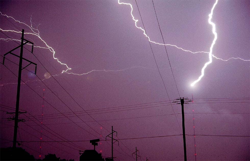 Figure 2. Lightning strikes over power lines