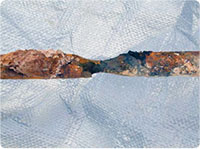 99-micron thick zinc-coated ground rod extracted from the soil (clay loam) 10 years later