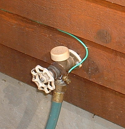In the photo: grounding conductor is connected to the pipeline, is used in potential equalization system