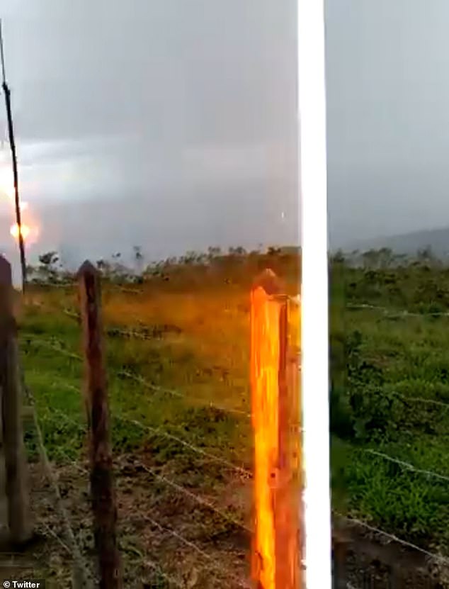 Lightning strike close to a person (video)